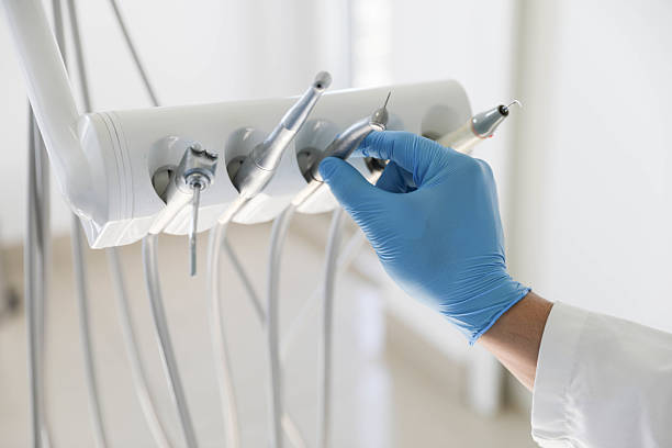 Professional Tooth Extraction technician working in Prosper, TX